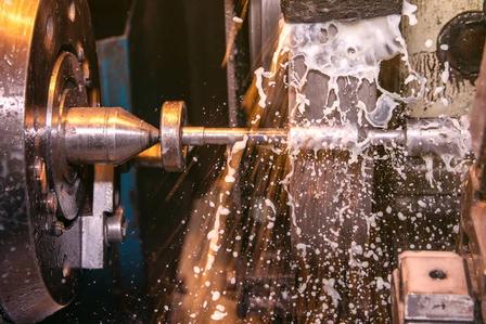 Precision CNC turned shaft components with coolant